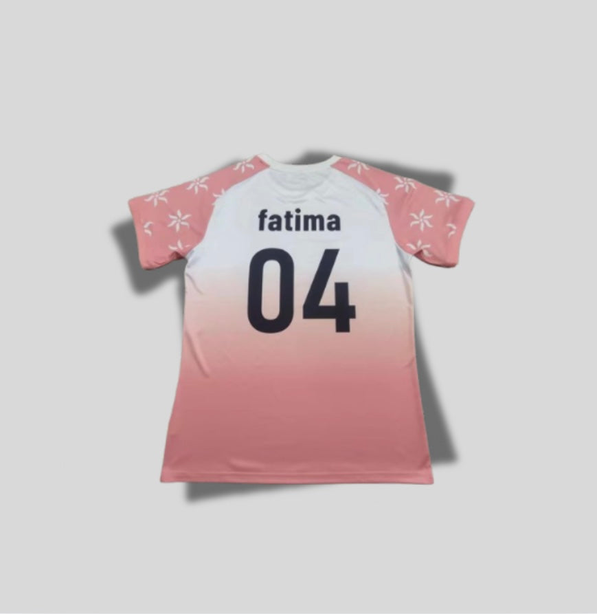Maillot rose à motif palmier noir